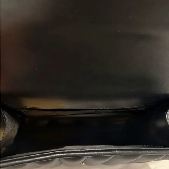 Michael Kors Black Quilted Crossbody Bag with Gold Accents
New with Tags - Picture 3 of 4